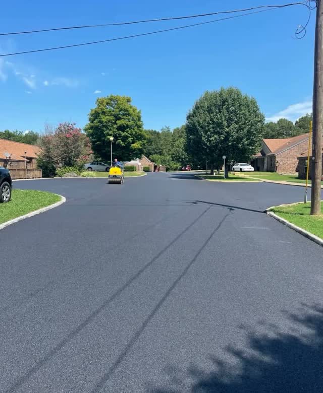 Freshly paved neighborhood street and cul-de-sac